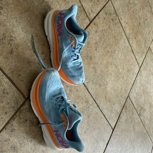 Ladies Hoka Clifton 9 shoes.